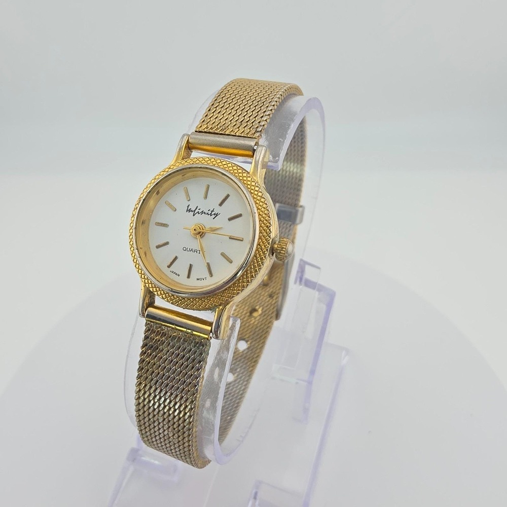 Vtg INFINITY Ladies Watch Textured Bezel Weave Link Mesh Straps Gold Tone 7.25"